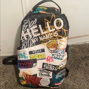 Graffiti Style Backpack with Multicolor Design